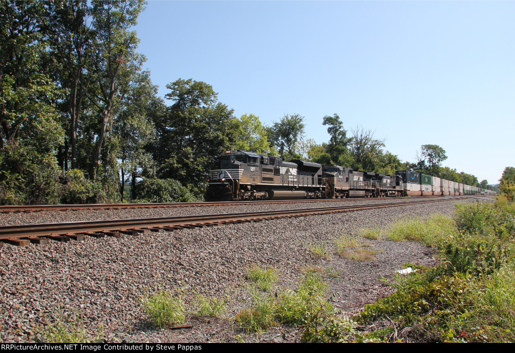 NS 1217 takes a stack train west past MP 116